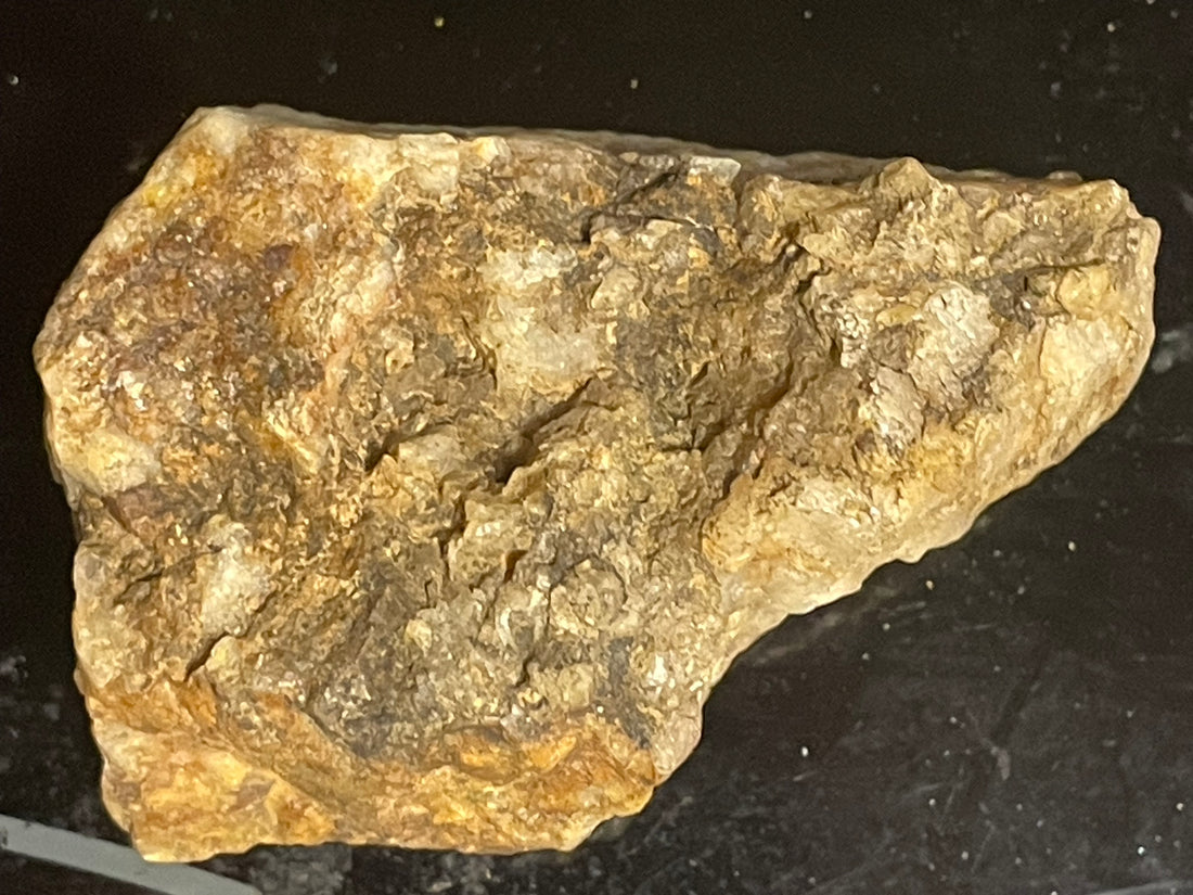 The image here is of a stone called a pictograph. It has been modified by man to display many images of characters and events.